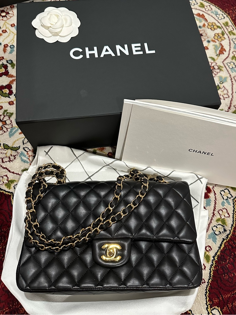 CHANEL Medium Classic Flap, in Black Quilted Lambskin with Gold Hardware